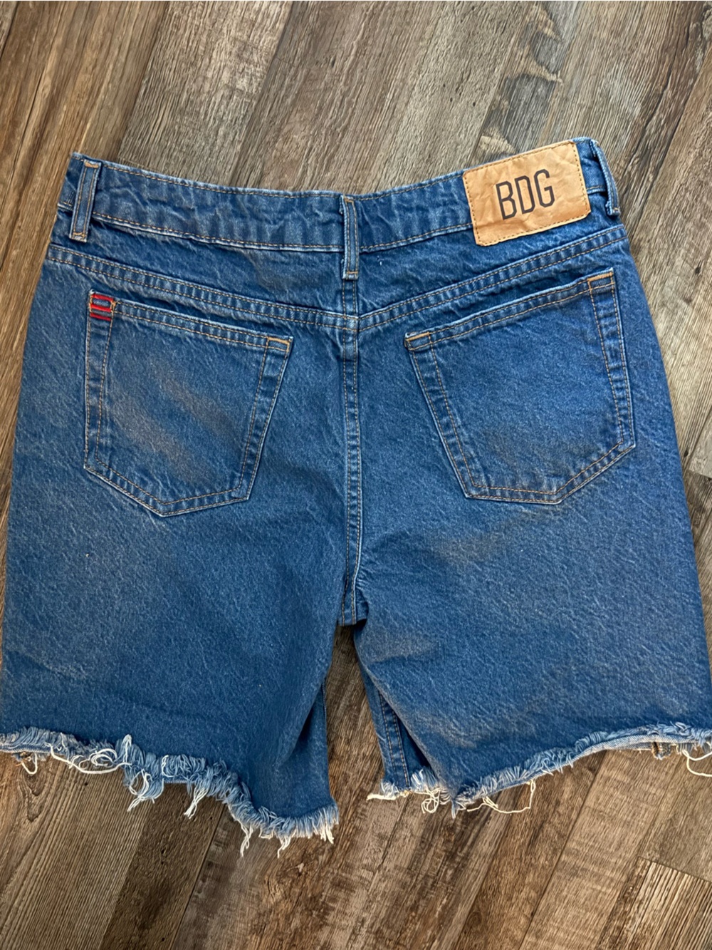 BDG Relaxed Cut-Off Denim Shorts in Medium Blue